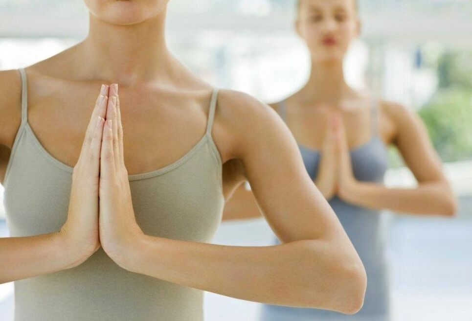 Girls do yoga for weight loss
