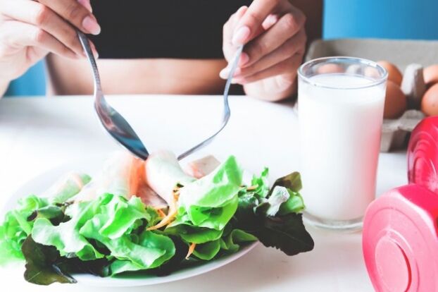 Salad and glass yogurt