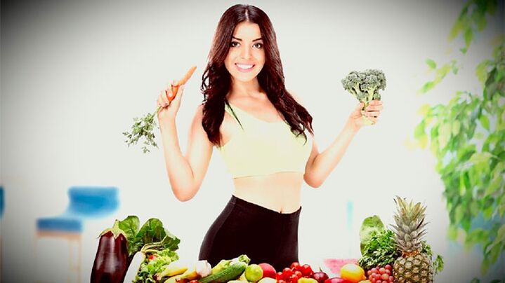 Slim girl with vegetables